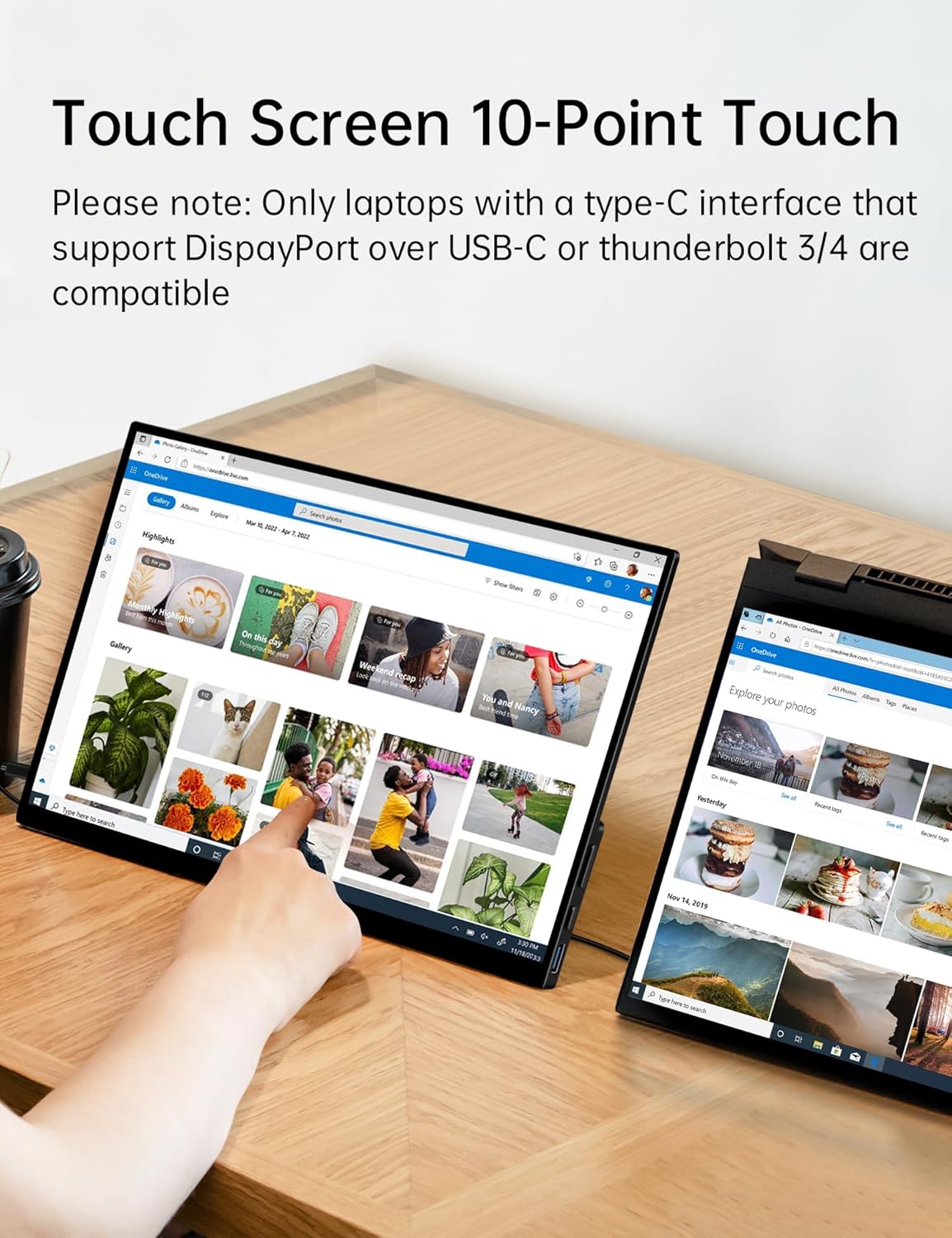Monitor portatil tactil de 15.6 pulgadas con vidrio templado y soporte integrado junto a un notebook en un escritorio.