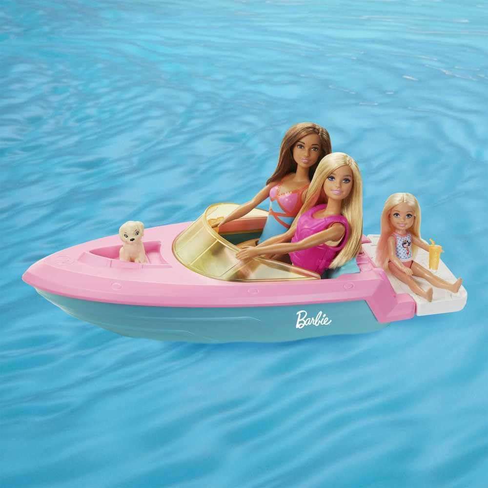 barco de barbie que flota en el agua con muñeca, cachorro y accesorios