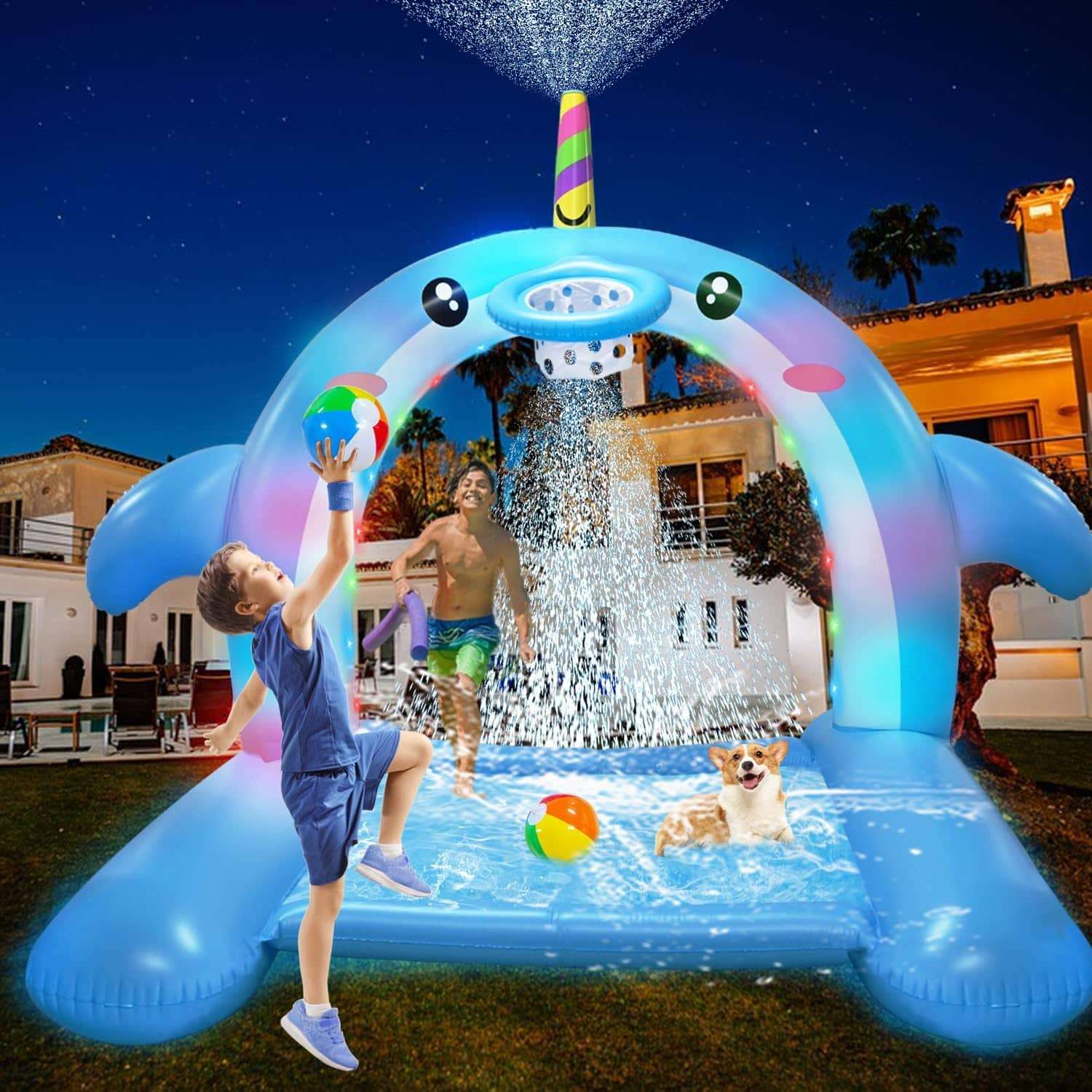 centro de juegos inflable de dinosaurios con tobogán y aspersor para niños